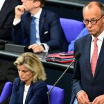 Merz zeigt Verständnis für Merkels Entscheidung zur Aufnahme vieler Geflüchteter